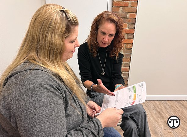 Michele Long, CNP, reviews the results of the GeneSight test with her patient, Beth. With a simple cheek swab, the test provides clinicians with a patient&rsquo;s unique genetic information that indicates which medications may require dose adjustments, be less likely to work, or have an increased risk of side effects.