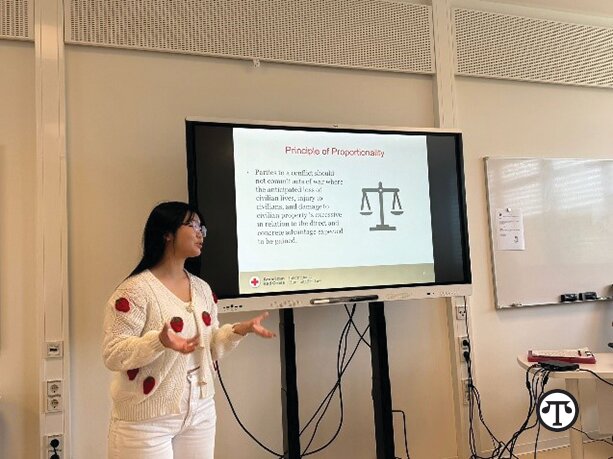 Rachel Oh briefs her military youth peers on the importance of international humanitarian law.